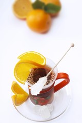 Orange tea in a glass cup
