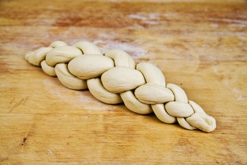 Braided bread or plaited loaf, unbaked