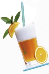 Drinkable yoghurt in a glass garnished with orange