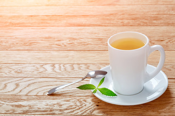 Hot earl grey tea with lemon slice top view on wood table