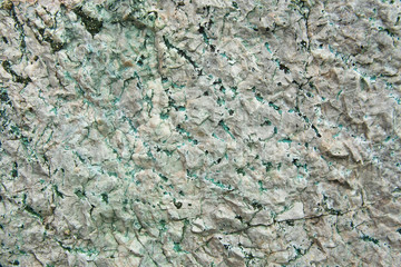 Stone with metal