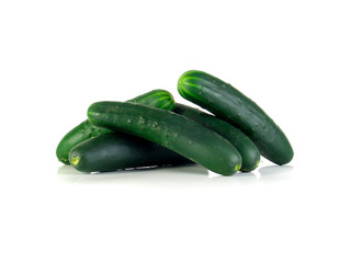 Fresh green cucumbers isolated on white background. Group of cucumbers.