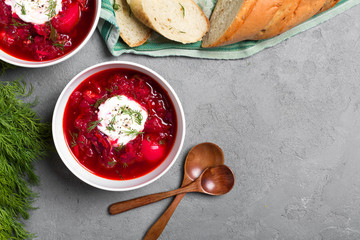 ed hot borsch beetroot soup with sour cream. A traditional russian soup. Top view. Fall dinner and lunch