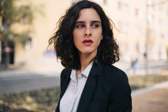 Portrait Of A Beautiful Woman In Suit On The Street