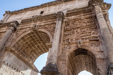 close up of arch of Titus in Rome on a sunny summer day