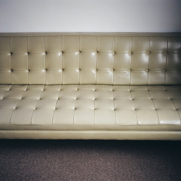 Retro couch in minimalist and modern hotel room