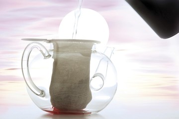 Water being poured into a sieve