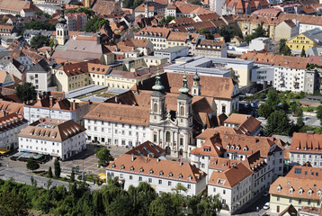 Fototapeta na wymiar From the Schlossberg castle hill to the pilgrimage church Maria Hilf Mary Help Order Graz capital of Styria Austria
