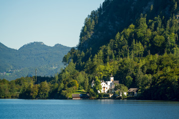 Fototapeta premium Castle Schloss on the Shoreline of Lake Hallstatt