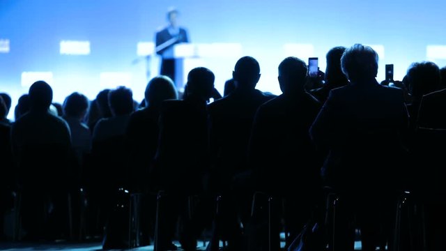 the speaker tells the speech at conference. Business People Seminar Conference Meeting Office Training Concept. Business and Entrepreneurship concept.