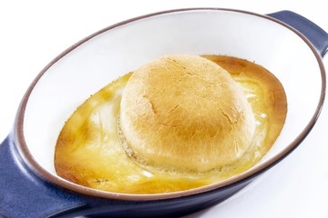 Dampfnudeln (yeast dumplings) in vanilla milk in a baking dish