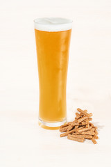 Glass, pint and bottles of beer isolated on a white background