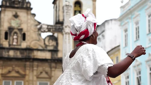 Brazilian Woman (Baiana) dancing in Salvador, Bahia, Brazil