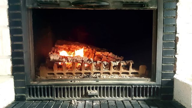 Close-up of Wood Burning In Stone Fireplace at Home - 4K Video
