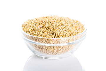 sesame placed in a bowl on a white background