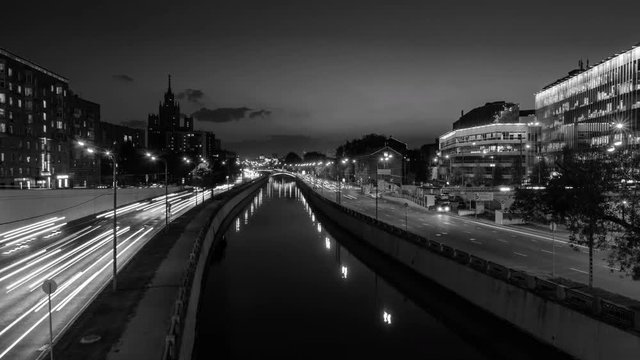 Moscow, Russia. Heavy traffic in the center of Moscow, Russia at sunset. Time-lapse and river. Black and white
