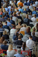 Audience at the conference, back view