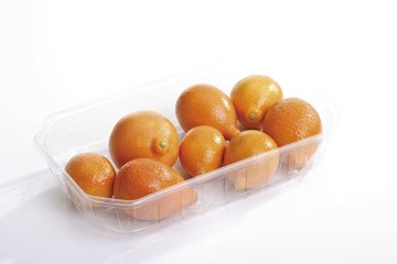 Kumquats from Israel in a small plastic tray