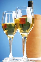 White wine with cooler in background