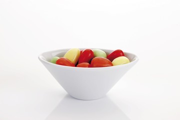 Candy eggs in a porcelain bowl
