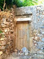 wooden door and stones
