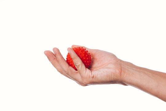 Male Hand With Stress Ball On White Background