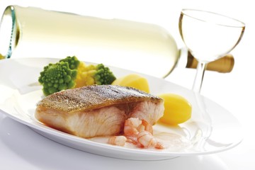 Roasted filet of cobia served with prawns, romanesco broccoli and potatoes