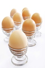 Brown eggs in spiral eggcups