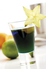 Cocktail, Blue Curacao mixed with Apricot Brandy and garnished with starfruit