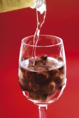 Pralines in a glass of liqueur