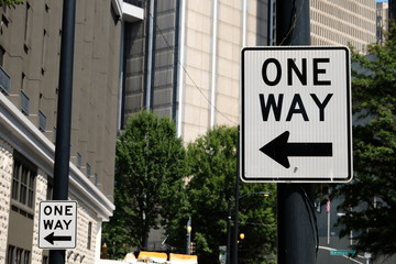 View of City Street Traffic Sign of One Way