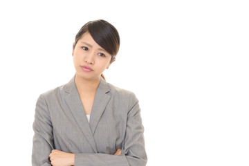 悩むビジネスウーマン