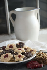 Holiday decorated cookis for entertaining - with country ceramic pitcher in background