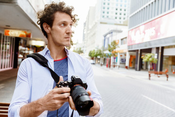 Male photographer taking picture