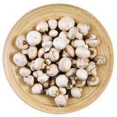 Button mushrooms on a plate