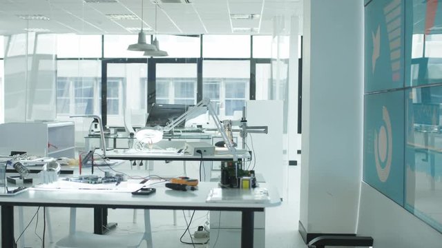  Interior view of work area in electronics factory. No people. 