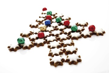 Christmas tree made of Cinnamon star cookies and chocolate balls