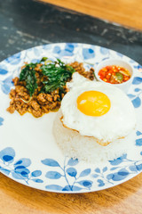 Spicy pork with basil leaf and rice
