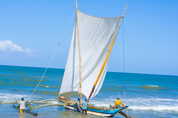 Sri Lankan traditional fishing catamarans in Negombo, Sri Lanka. Negombo is known for its centuries old fishing industry & long sandy beaches