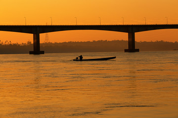 Pakse Laos silhouette sunrise bridge morning the life in Mekong river