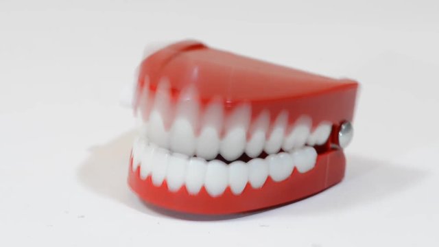 Funny false teeth moving fast.