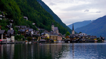 Fototapeta na wymiar Evening view of Lake Hallstatt and the village in the Alps, Austria.
