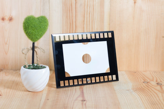 Picture frames on the wooden floor