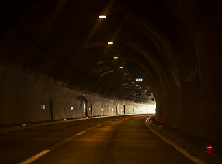 Small highway tunnel with lights