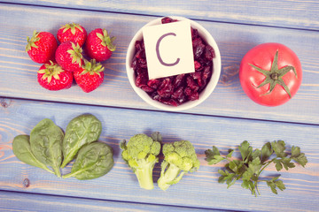 Vintage photo, Fresh fruits and vegetables containing vitamin C, concept of strengthening immunity and healthy food
