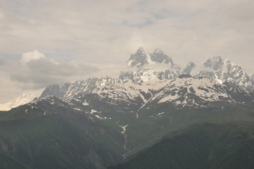 Ushba peak in the Caucasus Mountains. Snowy playing.