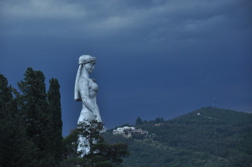 Tbilisi. View of the city and a monument to the mother of Georgia from the hill during the storm.