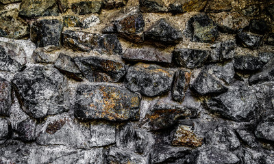 Very old stone wall. Old building. Stone background