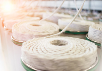 Wool bobbin in the textile workshop	