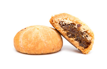 traditional chinese snack of pineapple cakes with one cut out on white background